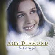 Der musikalische text NU TÄNDAS TUSEN JULELJUS von AMY DIAMOND ist auch in dem Album vorhanden En helt ny jul (2008)